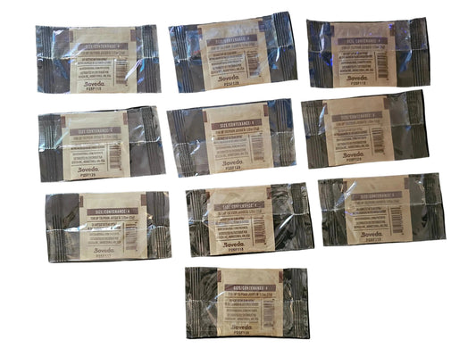 Multiple small packets of Novartis on a dark surface
